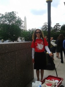 Molly Rauch with a wagon filled with MCAF letters to Congress