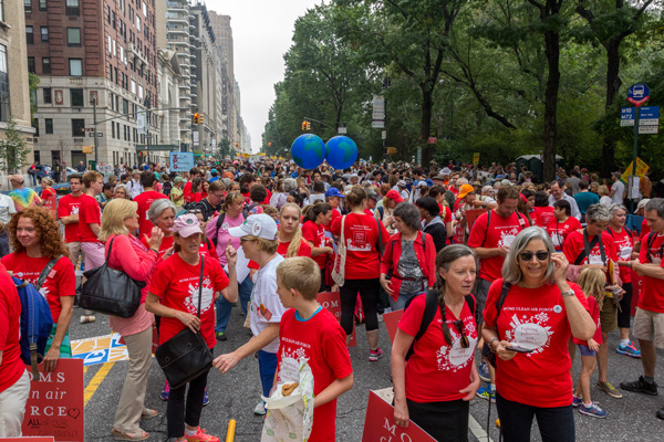 Central Park West is a sea of red Moms Clean Air Force t-shirts at the climate march!