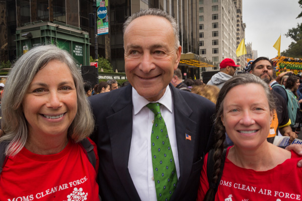 New York State Senator Chuck Schumer greets Ronnie Citron-Fink and Dominique Browning at the climate march.