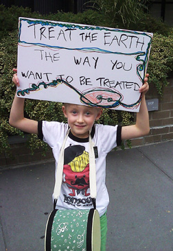 Boy with sign at the People's Climate March