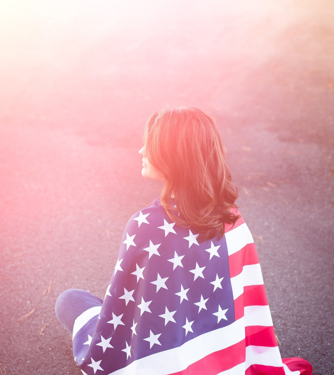 Woman draped in American flag