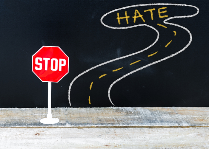 Stop sign on Hate Street illustration