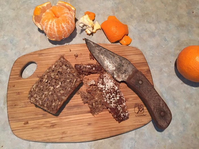 Food waste including moldy bread and clementine peels