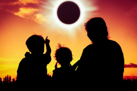 Family watching eclipse