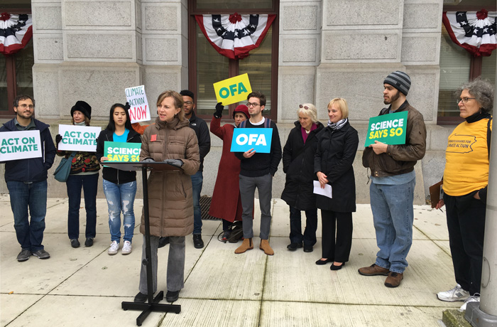 Moms Clean Air Force Philadelphia organizer Christine Dolle addressed the crowd at a rally in front of City Hall.