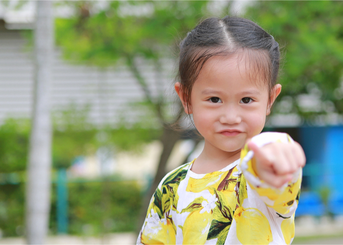 child pointing finger