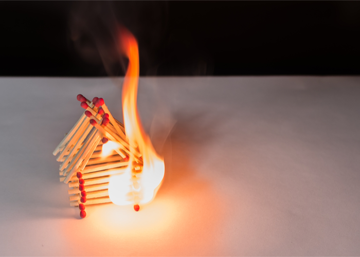burning matchstick house