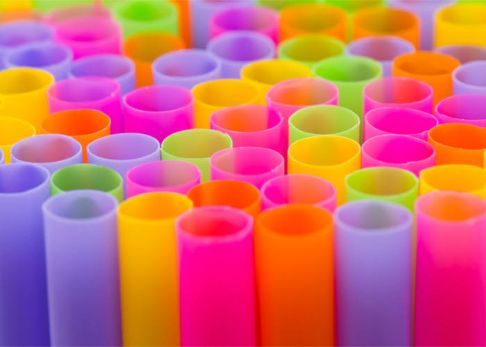 brightly colored plastic drinking straws