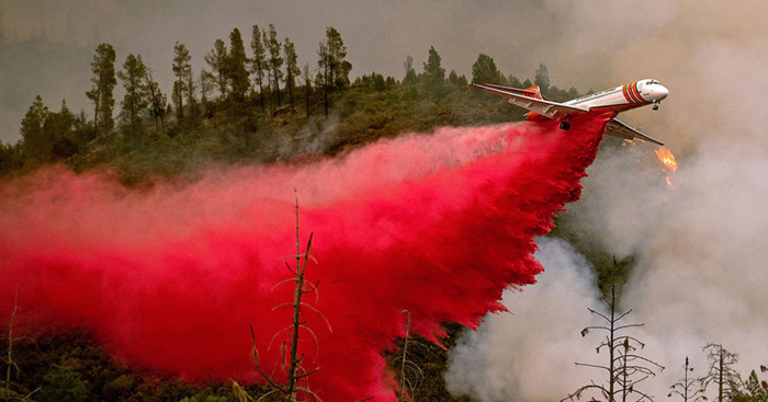A plane drops flame retardant on the Ferguson Fire near Yosemite National Park. 