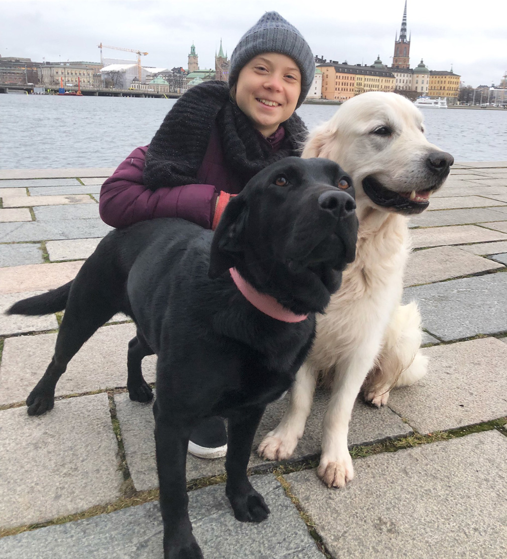 Greta Thunberg celebrated returning to Sweden this week with her dogs, Moses and Roxy