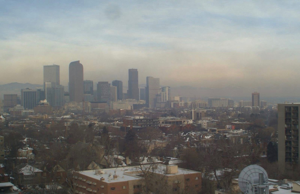 Smoggy downtown Denver skyline via the Colorado Department of Public Health and Environment, Air Pollution Control Division, Technical Services Program