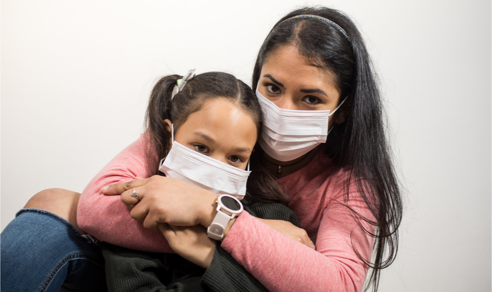 This mother and daughter from the Latino community wear face masks to help curb the spread of COVID-19
