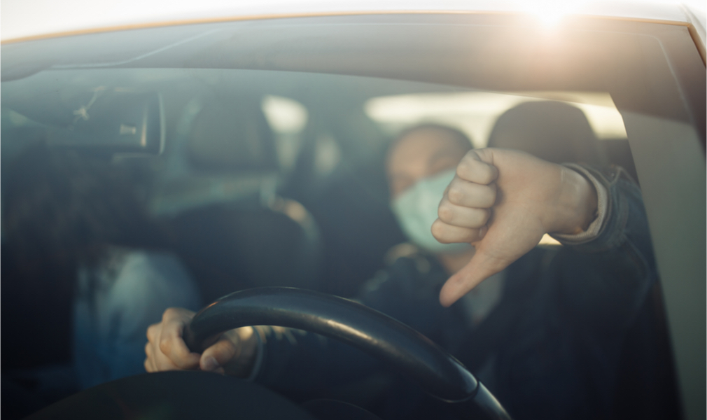 Driver giving thumbs down to automakers supporting rollbacks of pollution standards