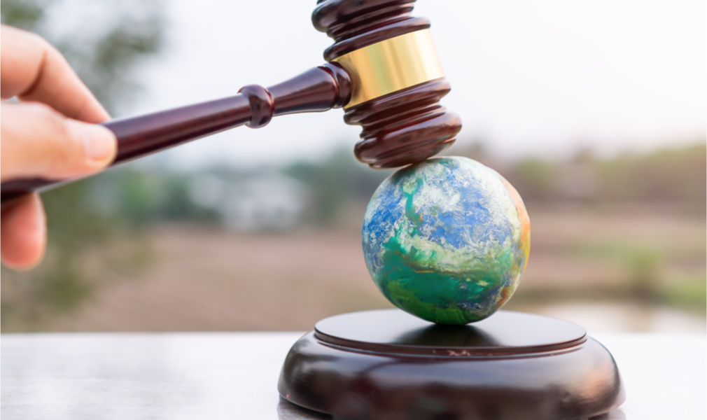 Picture of gavel on globe - the EPA is not exempt from the Civil Rights Act