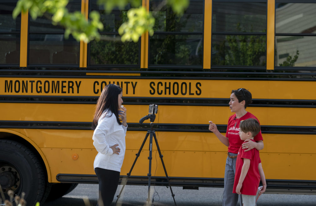 On May 4, 2022, EcoMadres filmed an segment about electric school buses with Telemundo DC at Rock Creek Forest Elementary, in Montgomery County, MD. Photo/Gemunu Amarasinghe for Moms Clean Air Force