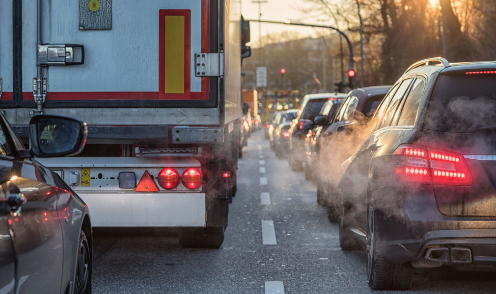 Cars and trucks producing air pollution