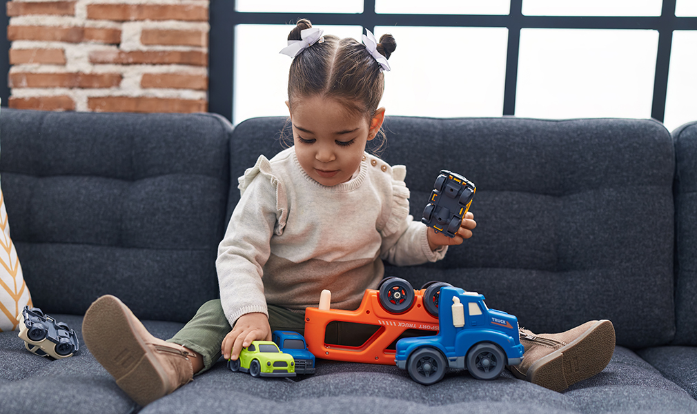 This child playing with toys could be exposed to toxic chemicals in her home