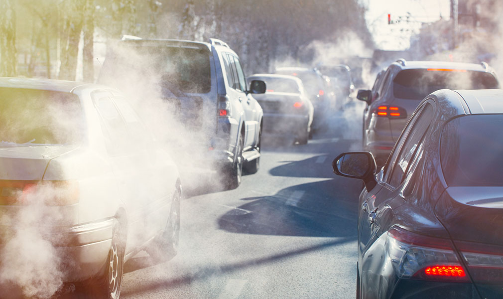 Tailpipe pollution coming from cars in traffic