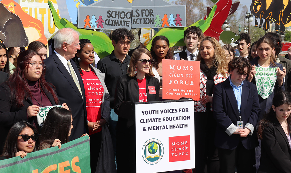 Elizabeth Bechard speaks at a press conference in support of mental health resources for youth impacted by the changing climate.
