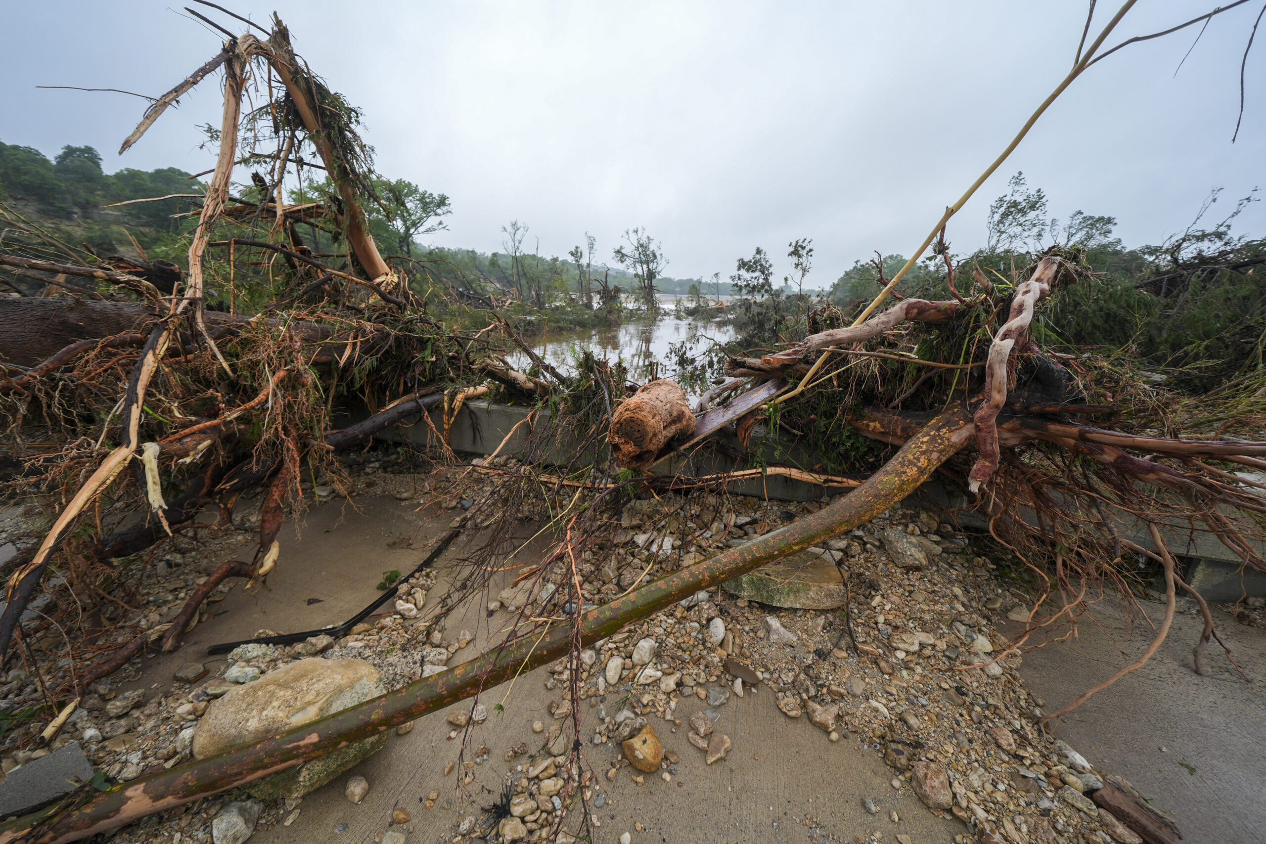 Debris on a bridge over the Guadalupe River after Texas flooding