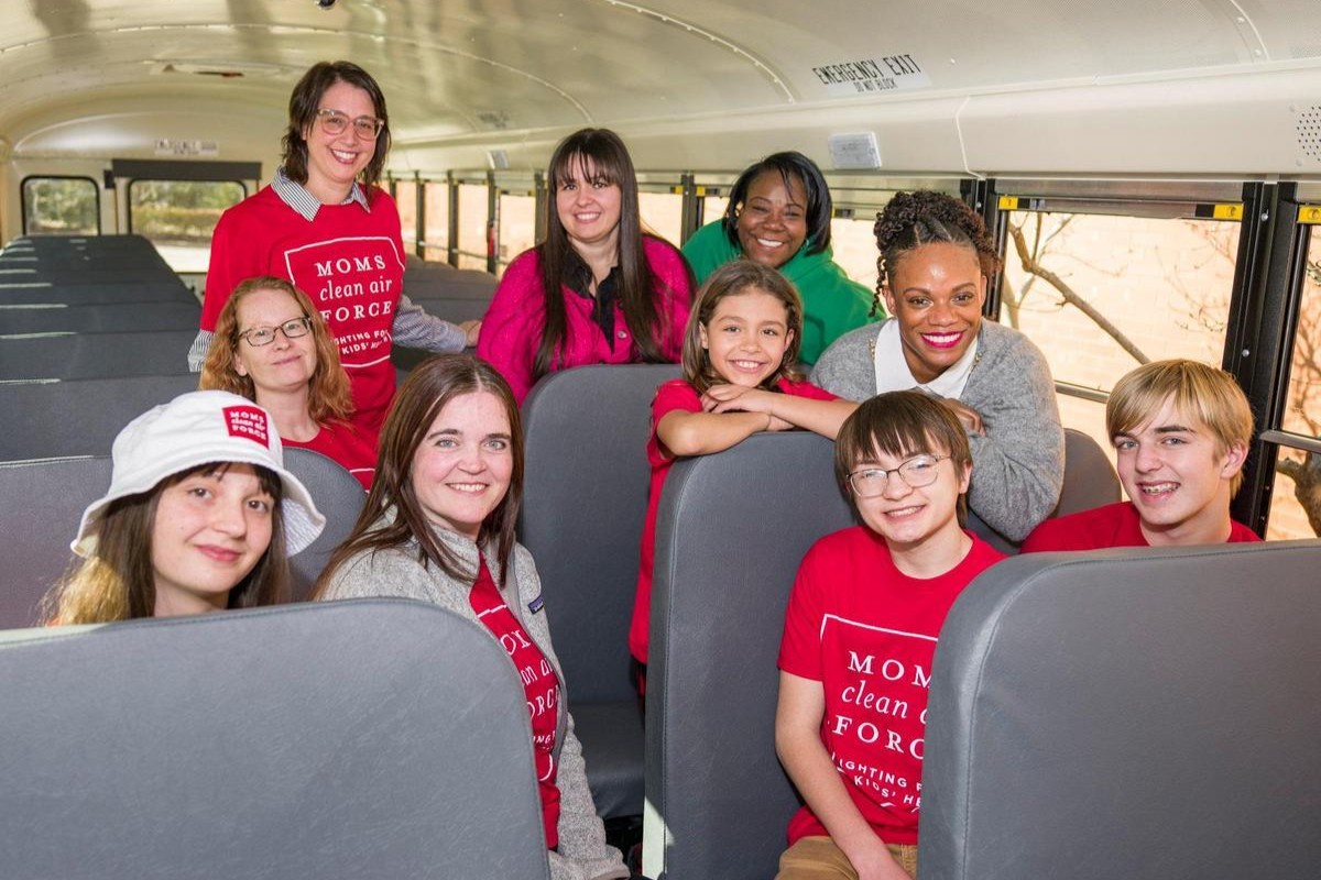 Kids on electric school bus
