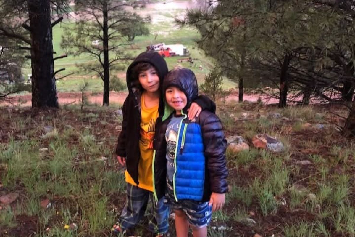 Kids on safe high ground at their family ranch
