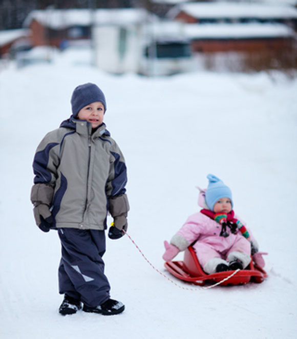 Kids in winter with sled