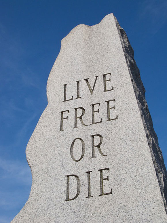Live Free or Die carved on a large stone